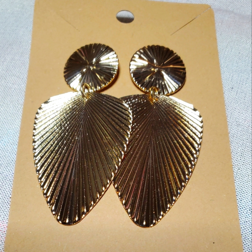 Gold in color post back earrings.